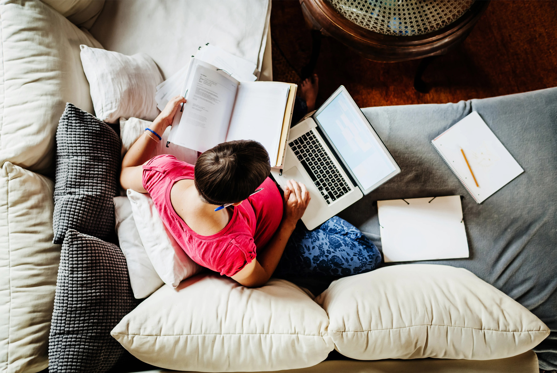 woman-on-sofa-working-thumb